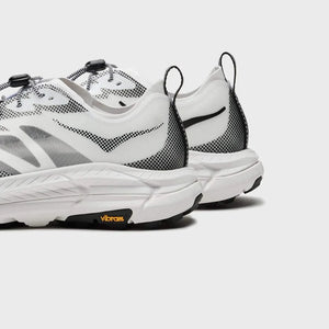 HOKA Mafate Speed 4 Lite trail running shoes with lightweight nylon upper and Vibram outsole in white and black