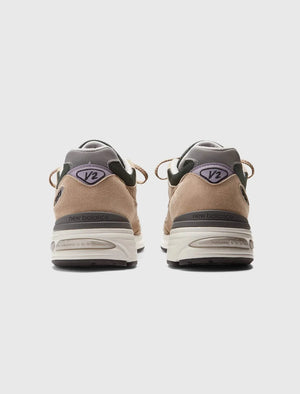 Rear view of Made in UK 991 V2 Cement sneakers by New Balance with suede and mesh upper